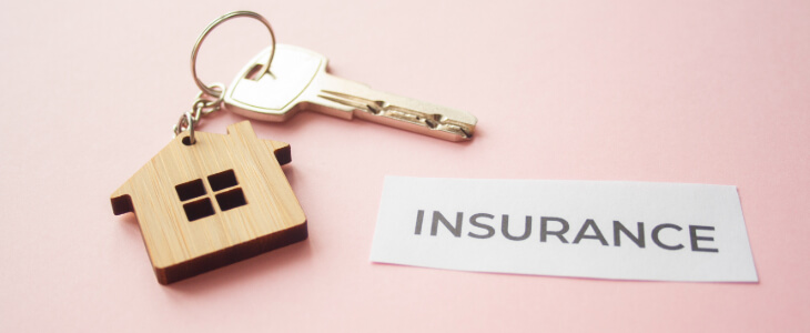 image of keys with the text insurance next to it