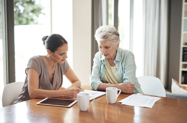 Older woman working on her estate plan with attorney
